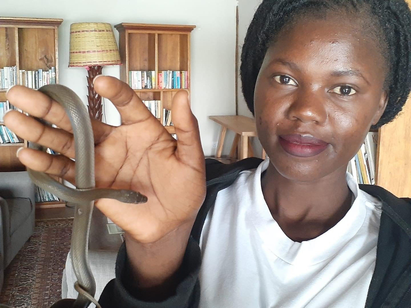 Meet 23 Year Old, Ugandan Wildlife Handler, Akello The Snake Girl,